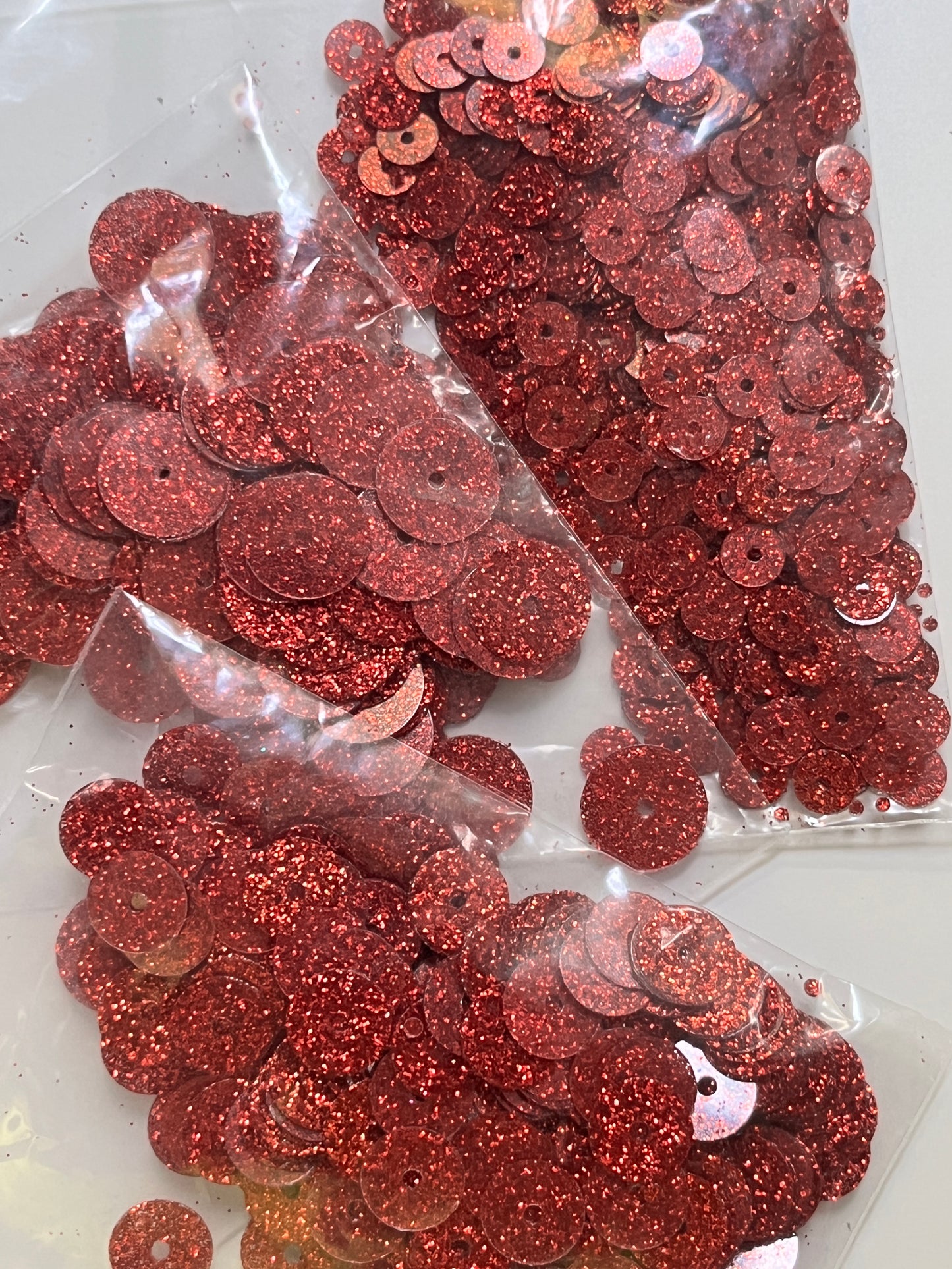Three .2 OZ Bags Red Sequins