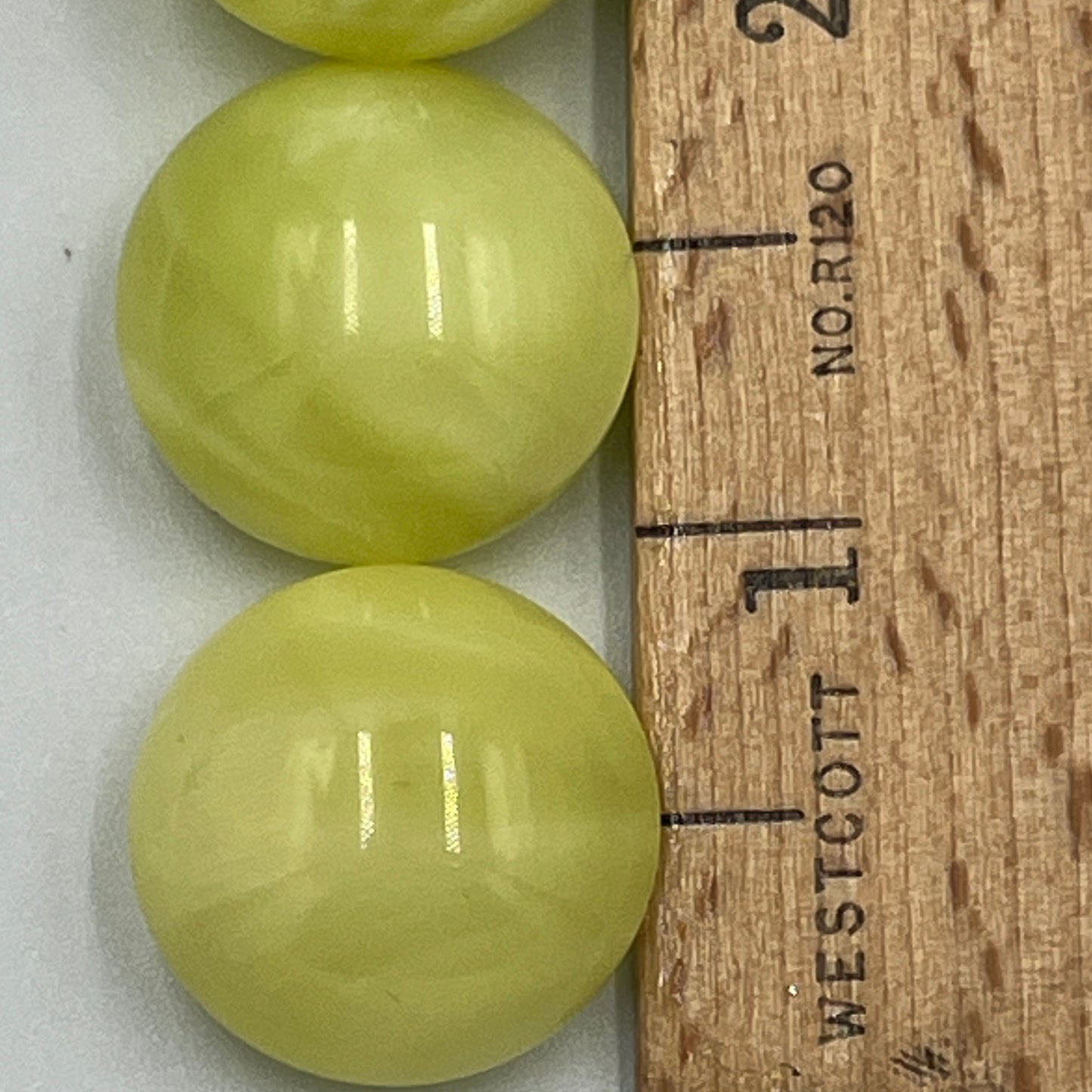 Four 8/10 Inch Vintage Glass Buttons